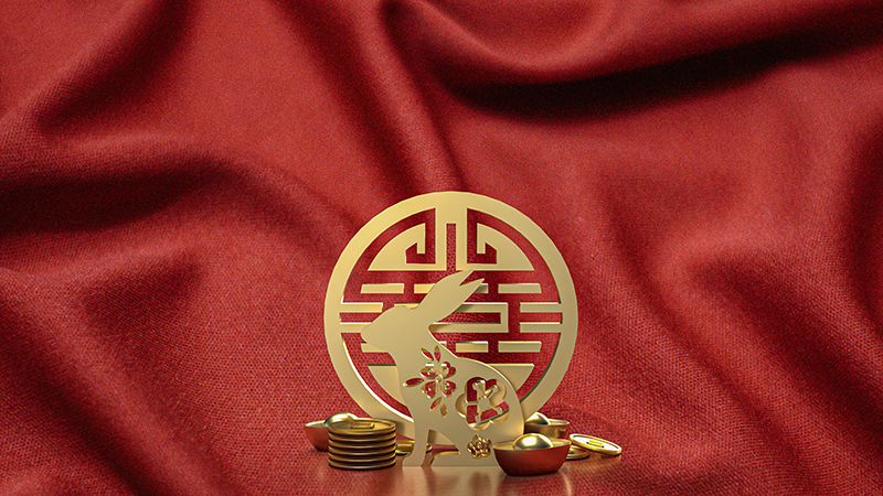 gold rabbit and Chinese stamp symbol for Year of the Rabbit 2023