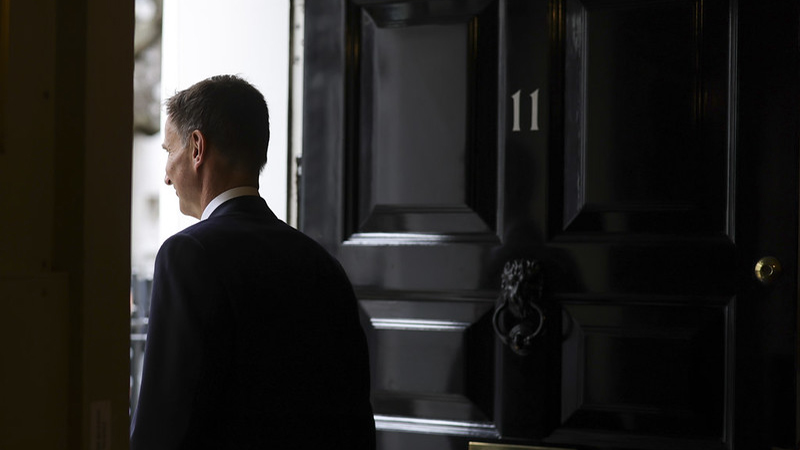 Chancellor of the Exchequer Jeremy Hunt prepares to leave 11 Downing Street to present his Budget to Parliament.