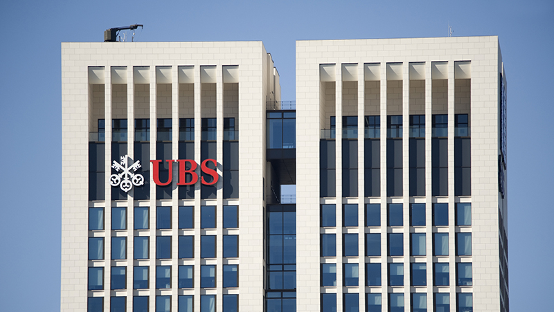 Frankfurt am Main, Germany - September 30, 2011: UBS Logo at the facade of the skyscraper Opernturm. UBS is a Swiss global financial services company headquartered in Basel and Z&amp;amp;amp;uuml;rich, Switzerland. The Opernturm is located opposite of the Alte Oper. The construction was finished in 2009 it is 170 meter high .