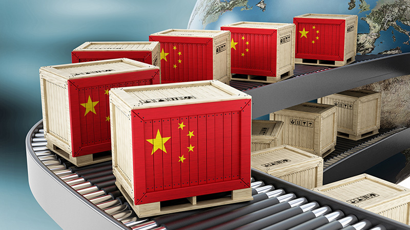 Transport crates with Chinese flag on the conveyor belt. Global exportation concept.