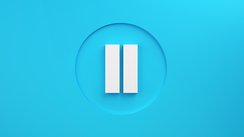 Pause symbol or push button on blue background. Taking a break or resting concept. Audio or music pause.