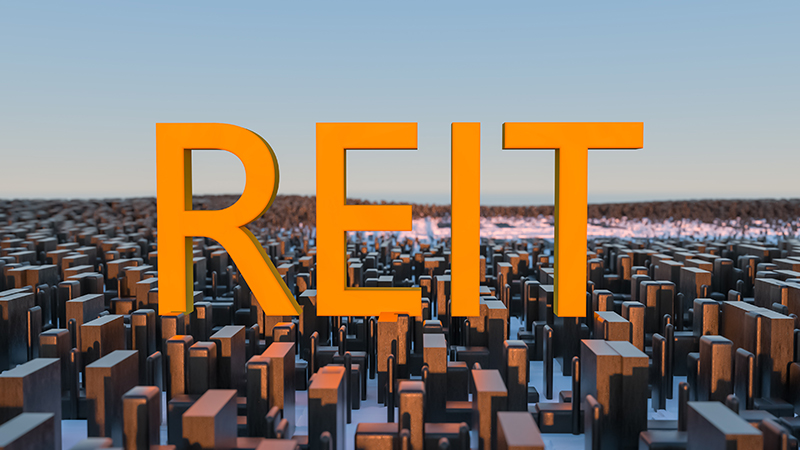 Concept image of Business Acronym REIT as Real Estate Investment Trust. 3d illustration