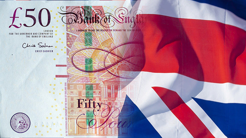 UK flag and new fifty pound notes blended to show the Brexit payment.