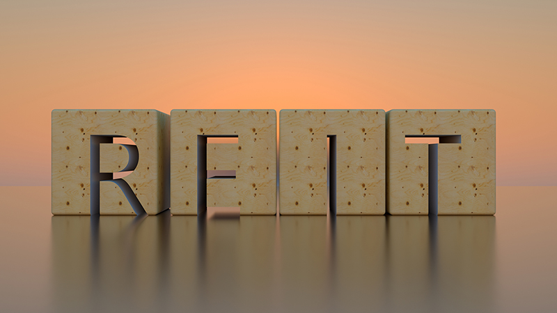 Concept image of Business Acronym REIT as Real Estate Investment Trust. 3d illustration