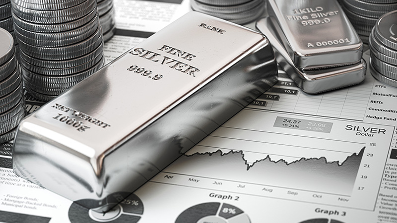 Silver bar, ingots and coins on financial report. Growth of silver on stock market concept. 3d illustration