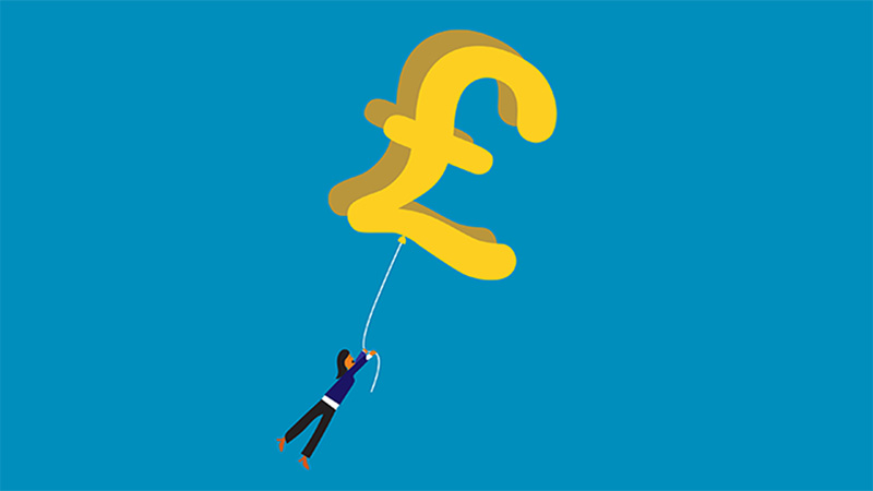 Business professional desperately holds onto inflated pound symbol as it floats away.