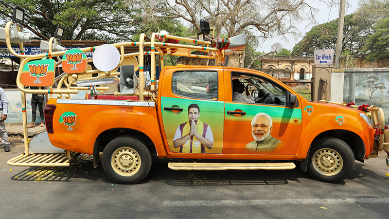 Mysuru, Karnataka, India-April 17 2024; A Pick up Truck converted into a Political campaign Vehicle for Indian elections 2024 under BJP Prime minister Narendra Modi in Mysuru, India.
