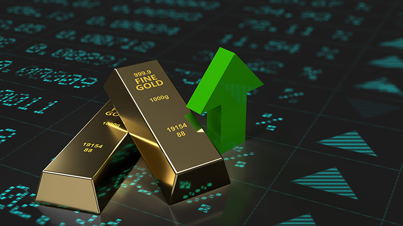 3D rendered, gold bars and green up arrow on dark stock market financial graph surface. Large copy space.