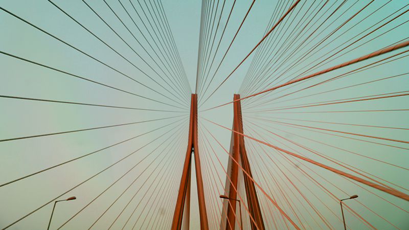 The Bandra-Worli Sea Link, officially called Rajiv Gandhi Sea Link, is a cable-stayed bridge that links Bandra with Worli in Mumbai, India. Huge cable supporting bridge.