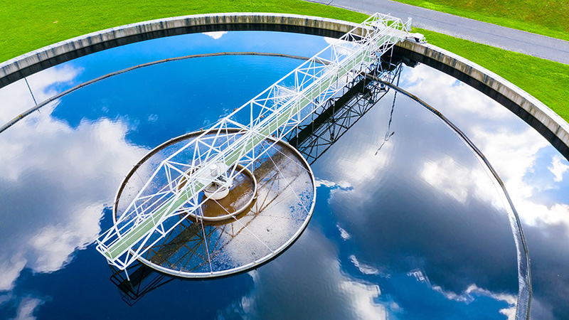 Sewage treatment plant from above. Grey water recycling. Waste management theme. Ecology and environment in European Union.