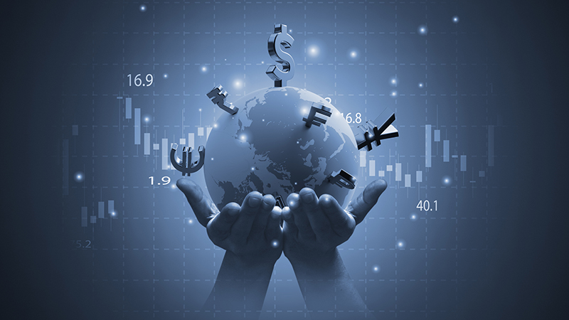 Hands holding world with international currency sign include dollar euro yen yuan pound sterling for money transfer and trade forex concept.
